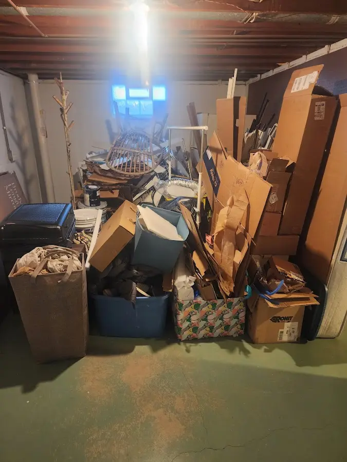 Roll-off dumpster container at job site for 15 Yard Dumpster Rental in Raynham